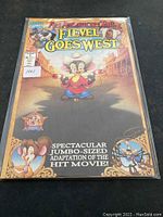 Front cover of the comic book with title and artwork of Fievel in cowboy attire.