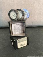 Original box with the Trio Weather Station set inside showing the three instruments clock, thermometer, and hygrometer.
