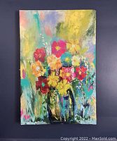 Photo of colorful mixed media floral painting on canvas with hand-painted details using Chalk Paint.