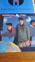 Photo showing vinyl album covers including Thompson Twins 'Into the Gap'