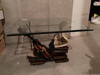 Angled front view showing glass top, violin and book base