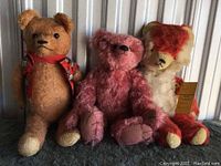 Three fully jointed bears together, showcasing size and colors