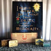 Metal sign with quote, vintage cigar box, and four metal tins on carpeted surface