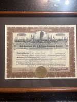Framed Mid-Continent Oil & Refining Company Limited stock certificate with brown border and detailed engravings.