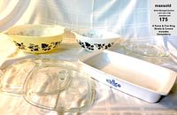 Full set of 6 pieces including 2 mixing bowls (white and yellow), rectangular baking dish with blue Gooseberry pattern, and 2 clear glass lids.