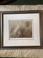 Full view of the framed and matted art print showing the artwork, frame, and matting.