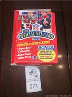 Photo of the front of the box showing the official NFL logo, featured players, and promotional text for Super Bowl collectibles and bonus prizes.