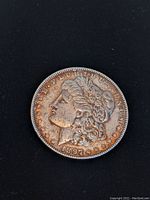 Obverse view showing Lady Liberty profile and date 1897.