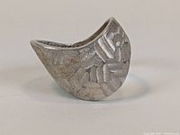Front view of Italian sterling silver modernist wave ring showing embossed pattern and matte finish.