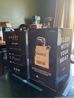 Box of Space Foam pillow showing branding and features