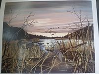 Full view of the signed print "Ducks" showing marshland, reeds, flying ducks, and sunset sky.