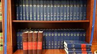 Set of West's Maryland Digest 2d law books volumes 1-21 on top shelf and volumes 22-46 on bottom shelf with Maryland Digest Descriptive Word Index volumes stacked.