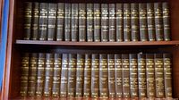 Full set of West's Maryland Law Encyclopedias on two shelves showing volumes and spines.