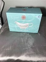 Closed box of Martha Stewart Collection 2 gravy boats shows branding and packaging.