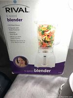 Box of Rival 6-speed blender showing product features and branding