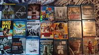 Photo showing 18 Blu-ray movies including The Last Stand, Alien, Mad Max, Furious 7, Epic, Dark City, Taken 2, Wrong Turn 4, Lockout.