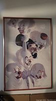 Full view of the framed Robert Owen clown art print showing seven clown faces in various expressions, signed by Robert Owen.