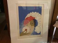 Full front view of framed lithograph showing overall condition and frame