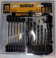 Photo of unopened DeWalt 18 piece black and gold drill bit set in plastic packaging.