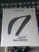 Front of the box showing the MONSTER Boomerang wearable speaker and Bluetooth logo.