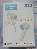 Front of the box showing product image, brand Soundcore by Anker, features including 40H Playtime, Qualcomm aptX, and crystal-clear calls.