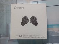 Photo of Tranya T10-B wireless earbuds box showing front with image of earbuds, brand name, model, and feature descriptions.