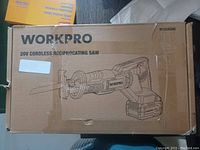 Original cardboard box of Workpro 20V cordless reciprocating saw with product illustration and branding on the front.