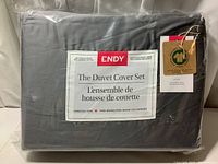 Packaged Endy duvet cover set with label showing King/Cal King size and storm gray color.