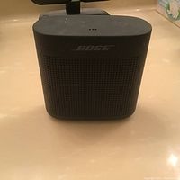 Front view of Bose SoundLink Color II speaker showing Bose logo and perforated grille.