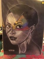 Full frontal view of signed print artwork by Sean Lamont featuring a stylized woman with zipper face design and color highlights.