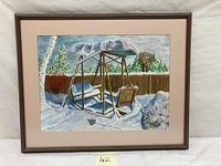 Oil painting showing motionless wooden swing set in snow with trees and fence background, matted and framed.