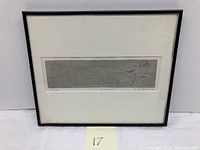 Framed etching with white mat and black frame, showing full artwork and frame condition.