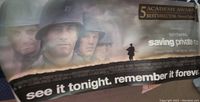 Poster showing headshots of soldiers from Saving Private Ryan and promotional text about awards.