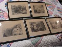Five vintage framed Bartlett etchings laid out on a quilted bedspread, showing size, framing, positioning, and general condition with some aging.