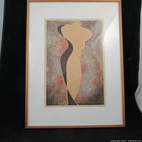 Full view of the framed woodblock print featuring an abstract nude figure in warm earthy tones with textured background.