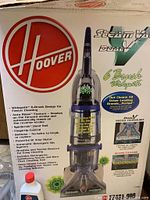 Photo of the Hoover Dual V Steam Vac box highlighting 6 brush widepath and features like auto rinse, spin scrub hand tool, beltless motor, and heated cleaning.