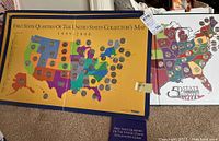 Three United States collector's maps with quarters embedded for each state, showing date range 1999-2008 and colorful designs.