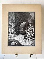 Frontal image of the engraving showing the waterwheel, snowy trees, and stone bridge with matting.