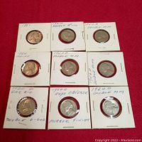 Nine Jefferson 5 cent coins from 1954, 1956, 1960, 1961, 1963, and multiple 1964 coins with notes about mint mark errors and finishes.