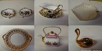 Overall view of the lot including fine china teapot, two porcelain bowls, two serving dishes, gravy boat, leaf dish, and swan candlestick holder arranged on table.