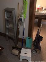 Full view of the lot's six items positioned near a wall with some furniture nearby.