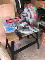 Full view of miter saw mounted on stand