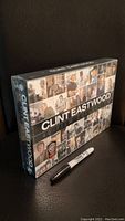 Sealed box set of Clint Eastwood 40 Film Collection DVD, front view with Sharpie marker for scale