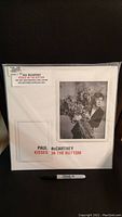 Front cover of sealed Paul McCartney 'Kisses On The Bottom' double LP showing album artwork and artist photo.