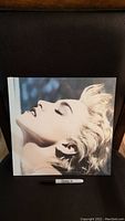 Front cover of the sealed Madonna True Blue LP showing Madonna's profile on white background