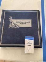 Front cover of navy blue vinyl baseball card album