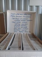 Box with handwritten list detailing 2002-2003 Upper Deck cards (3,600), 1991-1992 Bowman cards (400), Hat Tricks (21 cards), and base cards of hockey stars