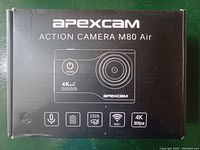 Front of the Apexcam Action Camera M80 Air box showing product name, 4K video at 30fps, WiFi, microphone, 170 degree wide-angle lens, and waterproof up to 40m icons.