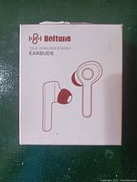 Closed white retail box with Boltune logo and image of earbuds.