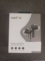 Front of packaging showing image and model name of EarFun Air Pro 2 wireless earbuds